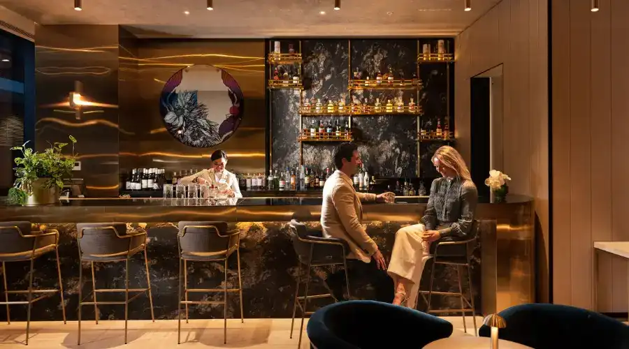 A couple enjoying a drink at Dorsett Melbourne’s Jin Bar. A couple enjoying a drink at Dorsett Melbourne’s Jin Bar.