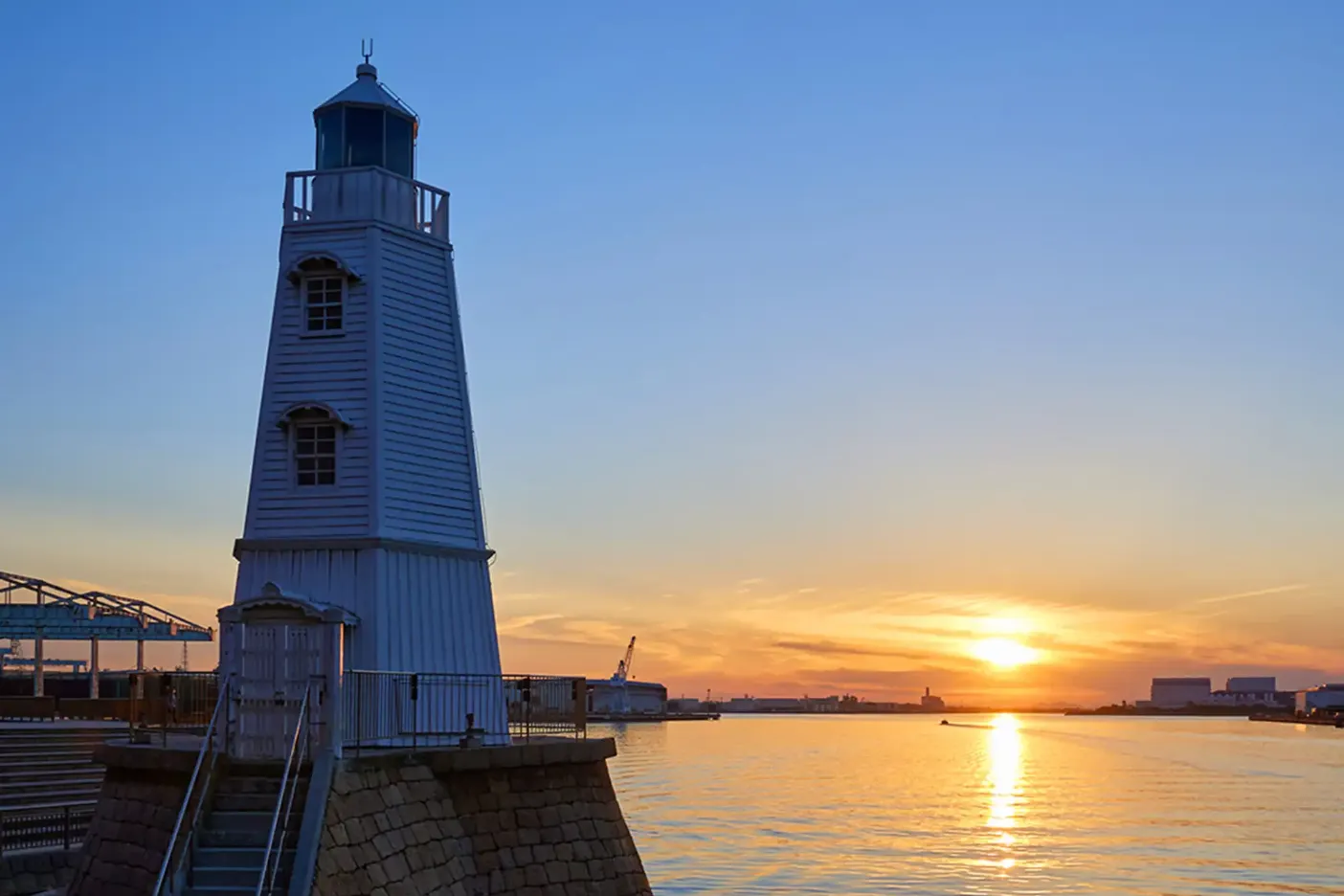 3D render of Old Sakai Lighthouse by the waterfront during sunset