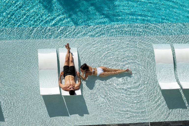 Guests in the Dorsett Gold Coast outdoor pool