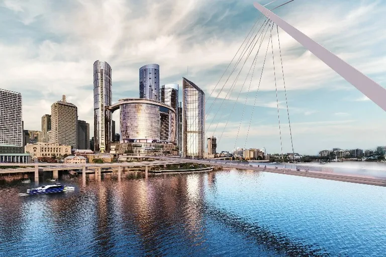 A sky view of Queen's Wharf tower, the city's riverfront, with a boat sailing in the Brisbane River, near the Dorsett Brisbane Hotel.