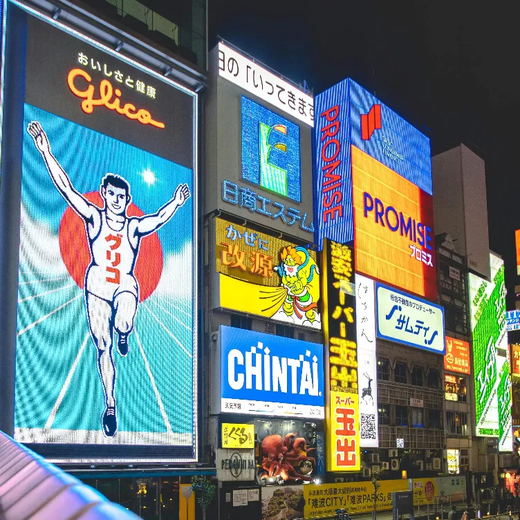 3D render of neon-lit streets and colorful billboards at Dotonbori Osaka