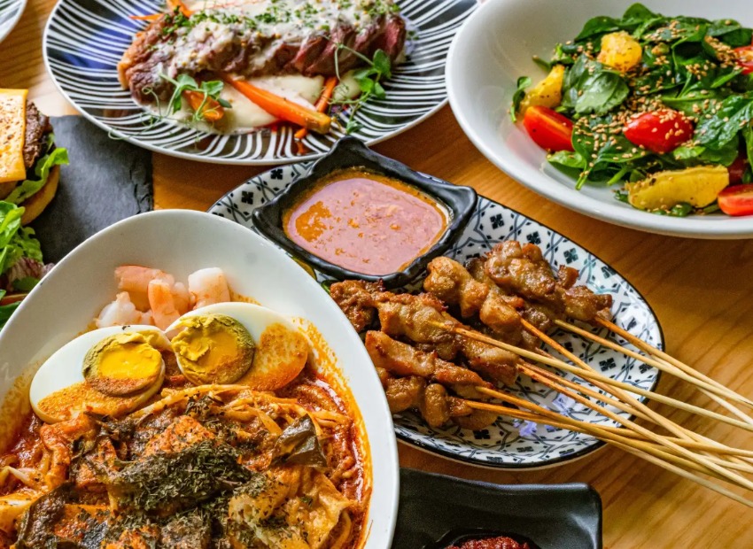 Chicken satay and other Asian dishes at Dorsett Changi.