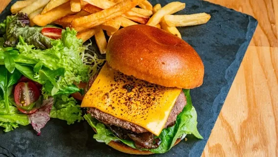 Burger, french fries and salad at Dorsett Changi.