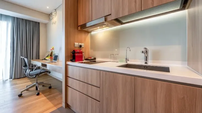 Work desk by the kitchenette in the Splash Room, Dorsett Changi.