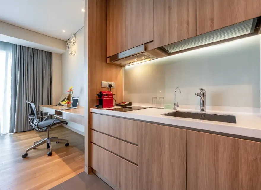 Work desk, settee and TV in the Splash Room, Dorsett Changi.