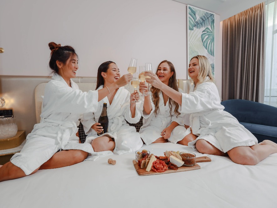 A group of ladies is toasting champagne at Dorsett Gold Coast