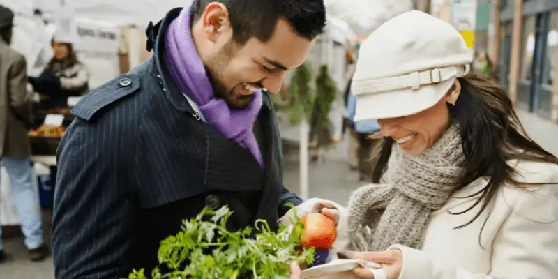 A couple shopping at the farmer market in Gold Coast.