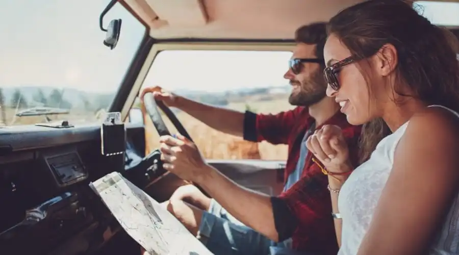 A man and woman in their car