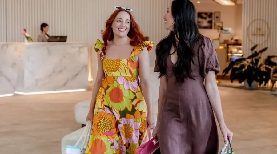 Two women walking through the Dorsett Gold Coast hotel lobby