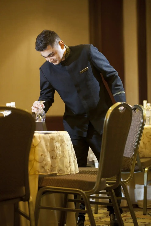 A busboy arranging tables Dorsett Grand Subang.