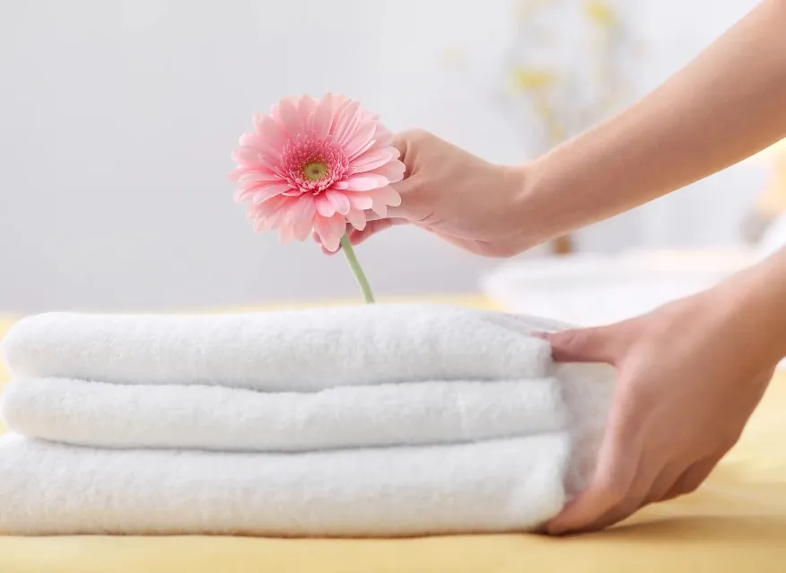 Housekeeping with flower on towels at Dorsett Hartamas.