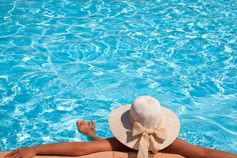 Lady relaxing in the Dorsett Hartamas Kuala Lumpur pool.