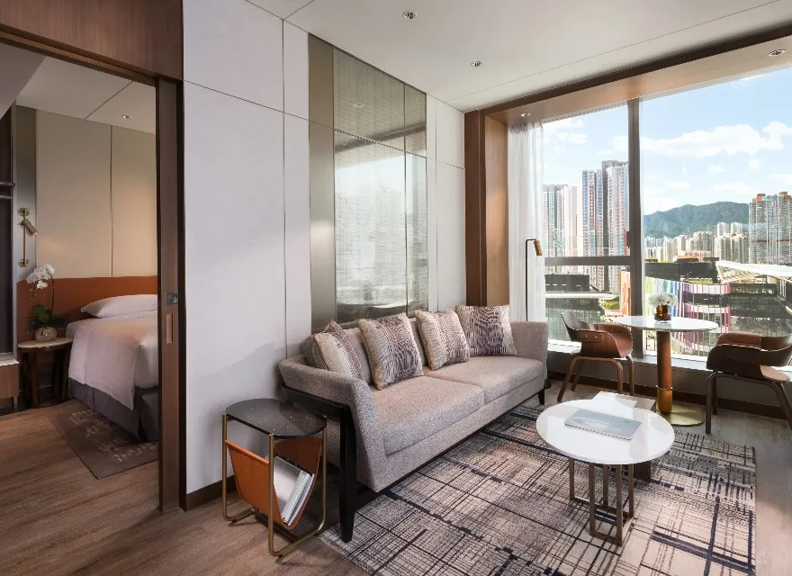 Living room in the Executive Balcony Suite at Dorsett Kai Tak Hotel.