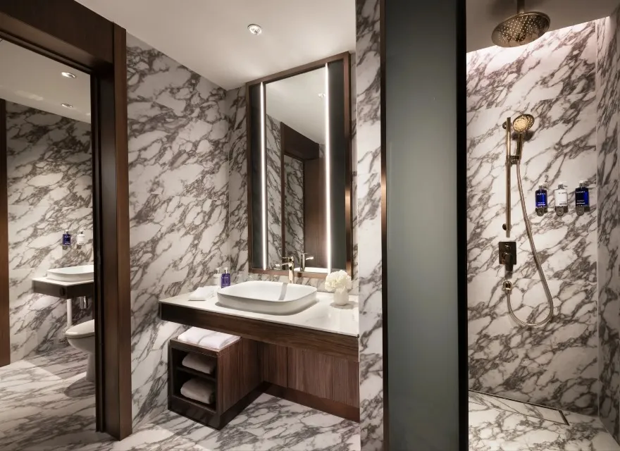 Sink and vanity mirror in the Executive Suite Bathroom at Dorsett Kai Tak.