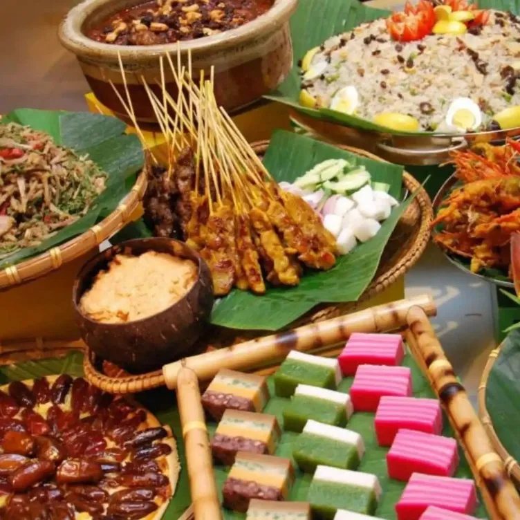 Malaysian cuisine like satay skewers, rice, curries, and desserts.