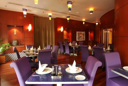 Purple themed seating at Dorsett Kuala Lumpur.