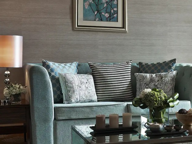 Coffee table by a sofa in a Dorsett Kwun Tong Bedroom.