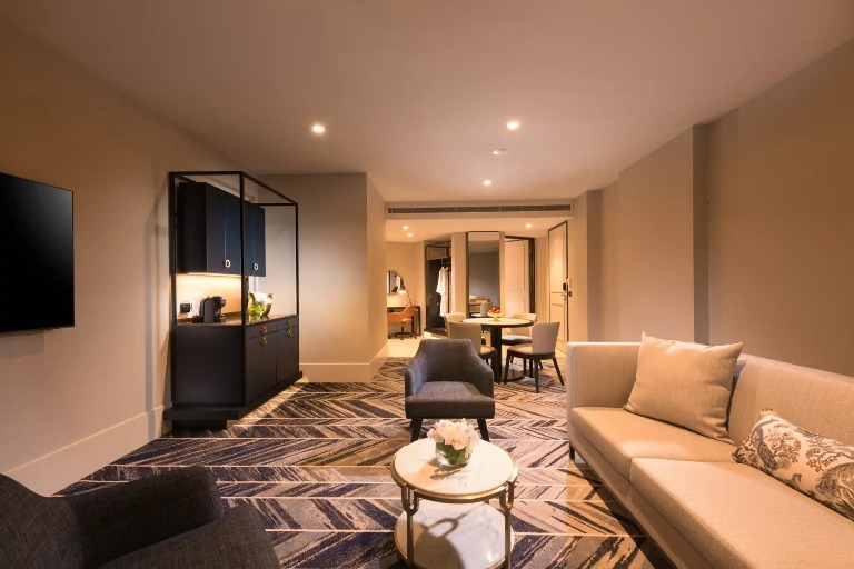 Living and dining area in Dorsett Melbourne Diva Garden Suite