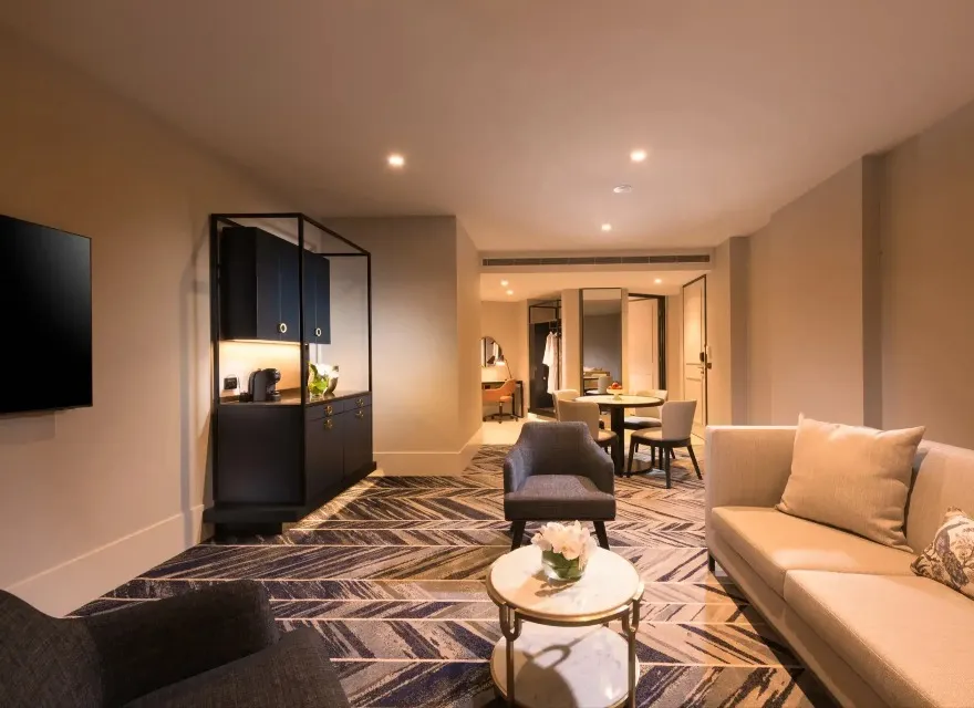 Living and dining area in Dorsett Melbourne Diva Garden Suite