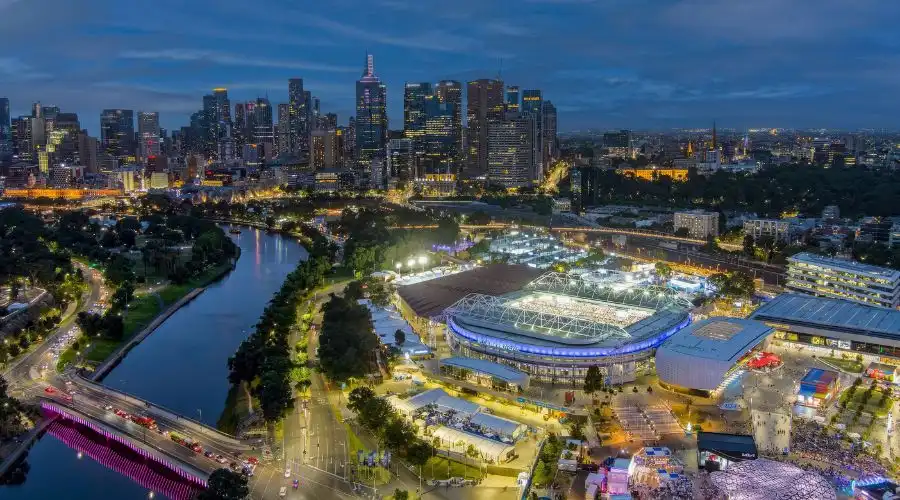 Aerial view of the Australian Open venue lit up at night in Melbourne 