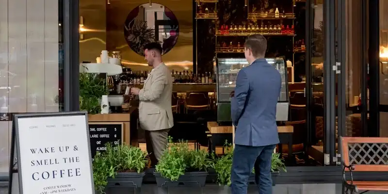 People getting coffee from the Little Jin coffee window