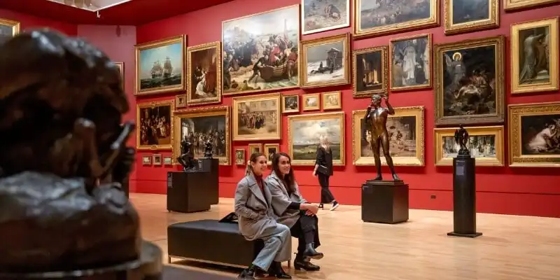 Two women inside the National Gallery of Victoria