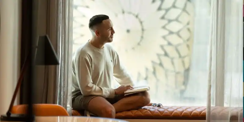 Man on seat in hotel