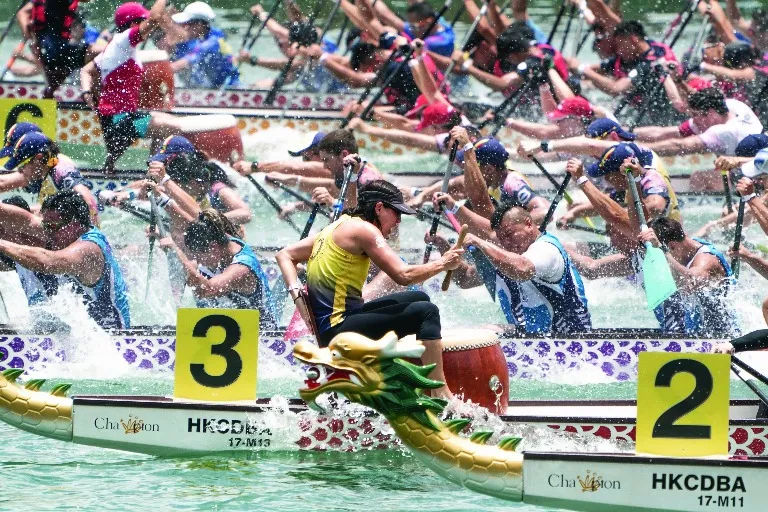 People racing at Dragon boat festival in Hong Kong