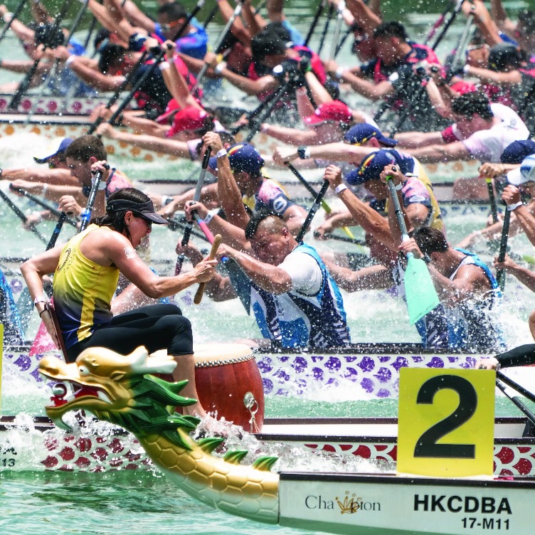 People racing at Dragon boat festival in Hong Kong