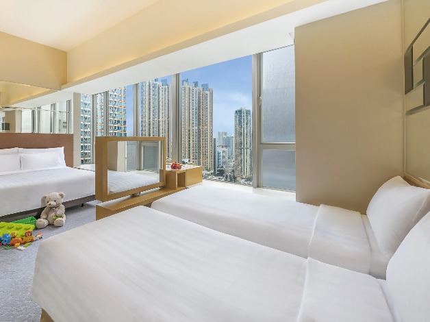 Toys and beds at Dorsett Mongkok Family Quad Room