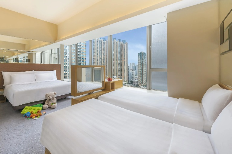 Toys and beds at Dorsett Mongkok Family Quad Room