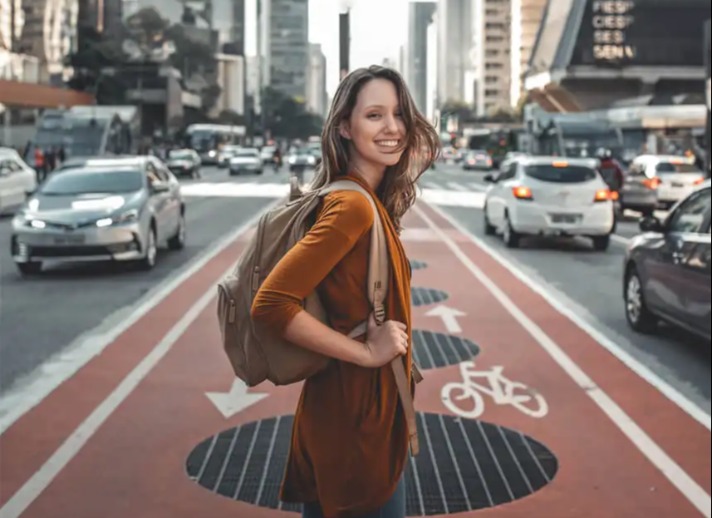 Girl in the middle of a bike lane in Mongkok city