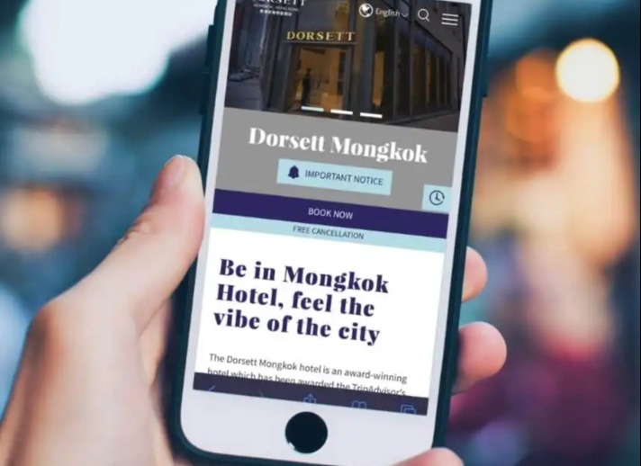 Person views the Dorsett Mongkok hotel website using a phone