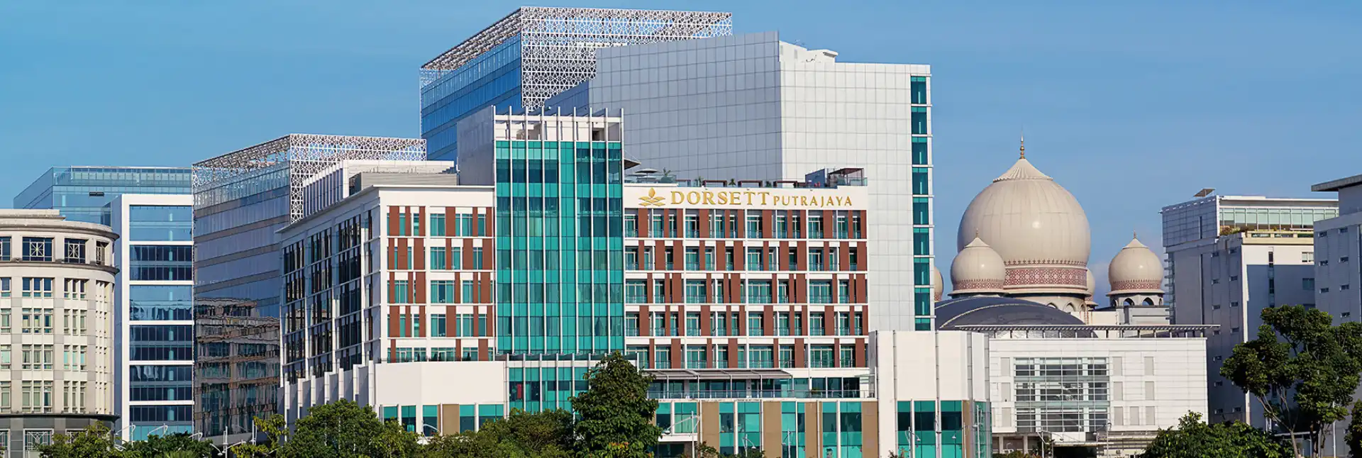 Exterior of Dorsett Putrajaya next to a mosque.