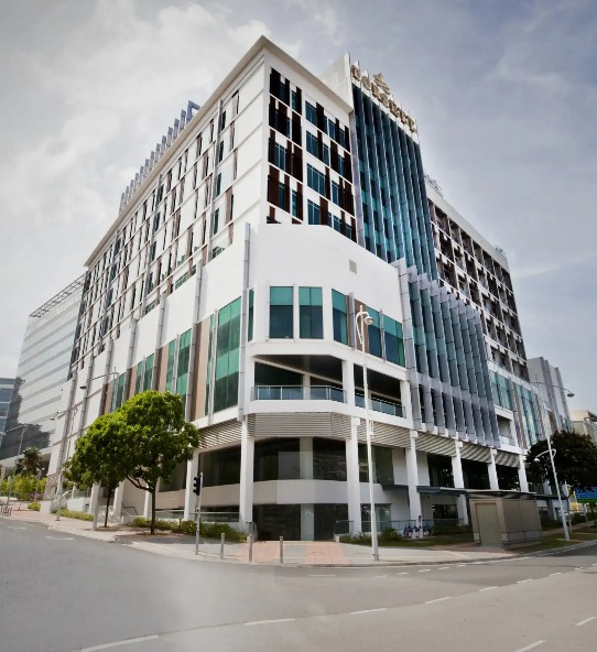 Facade of Dorsett Putrajaya with hotel logo.