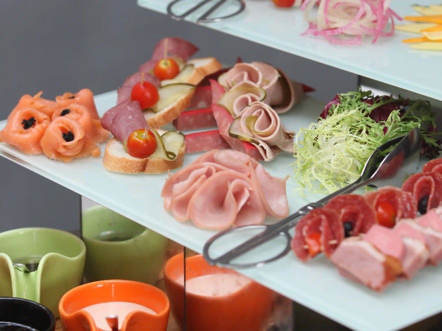 Cold cuts and salad dressing at the Gusto on the Green restaurant.