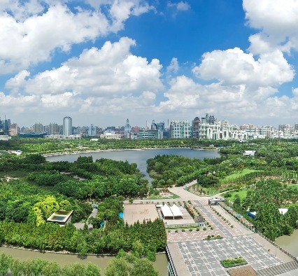 Century Park with a waterfront and is surrounded by trees.