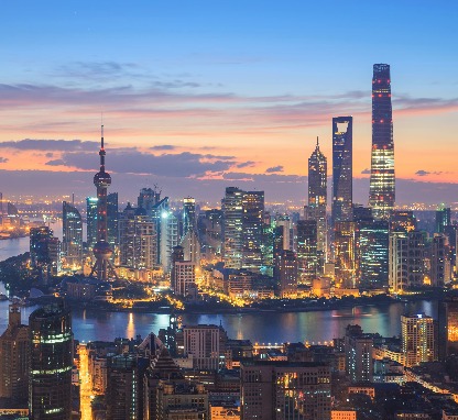 Nightscape of the city with large buildings and skyscrapers.