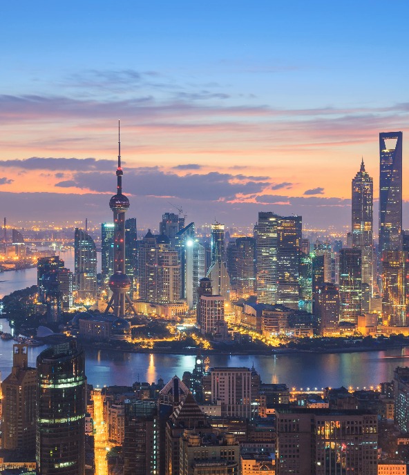 Nightscape of the city with large buildings and skyscrapers.