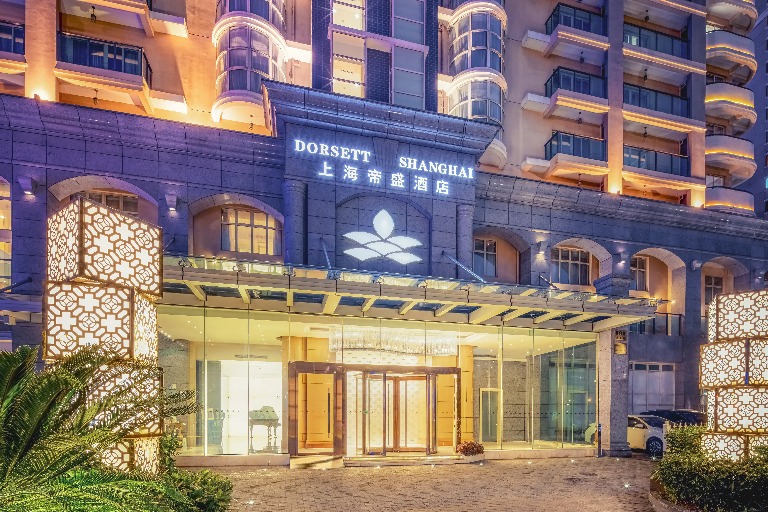 Exterior of Dorsett Shanghai Hotel during the night.