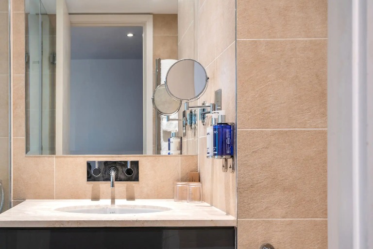 Single vanity with shaving mirror at Dorsett Room, Shepherds Bush London.