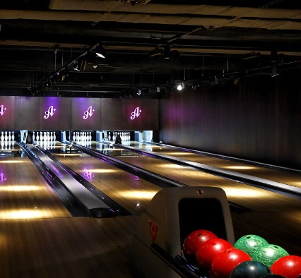 Red, green and blue bowling balls at All-Star Lanes.