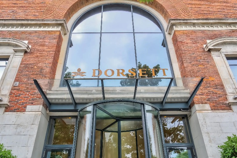 A low-angle view of the Dorsett Shepherds Bush London Hotel entrance.