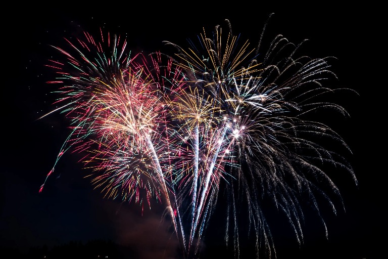 Fireworks with an array of colours in the night sky.