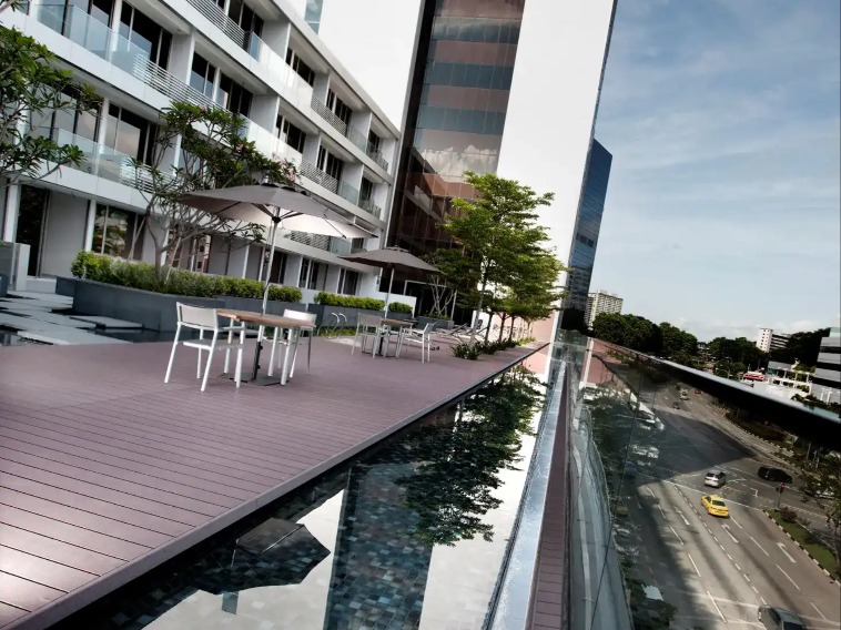 Dorsett Singapore exterior with glass balcony.