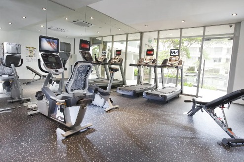 Cardio machines in the Dorsett Singapore Hotel gym.