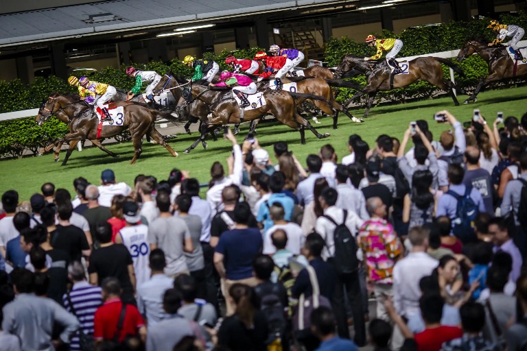 Horse racing in Hong Kong Happy Valley Racecourse near Dorsett Wanchai