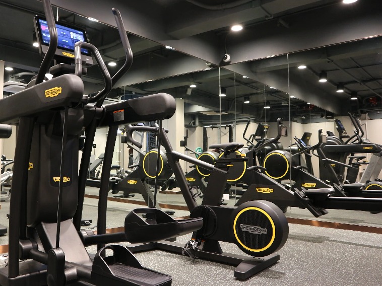 Treadmills and steppers in the gym room at Dorsett Wanchai Hong Kong