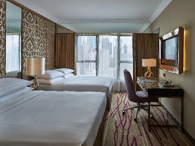 Two queen beds in the Deluxe Family Quad Room at Dorsett Wanchai