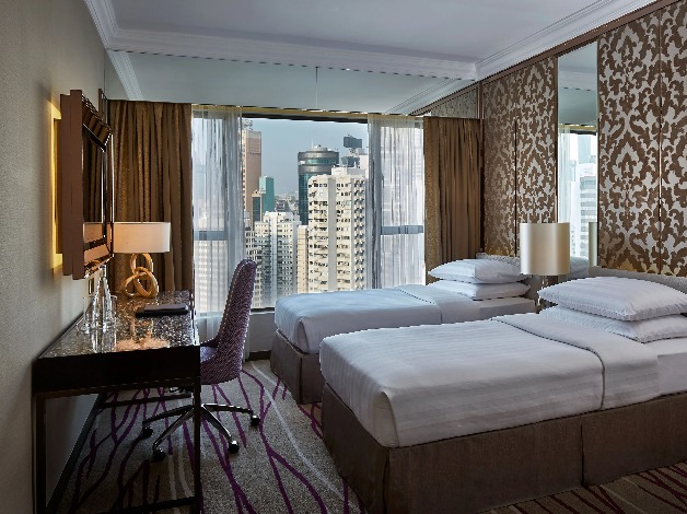 Two Twin Beds in the Premier Causeway Bay City View Room at Dorsett Wanchai